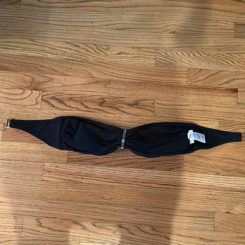 Women’s Michael Kors black swim top. Large‎